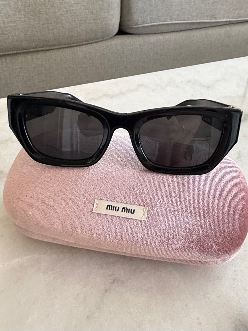 Miu Miu Black Cat-Eye Sunglasses with Dark Lenses